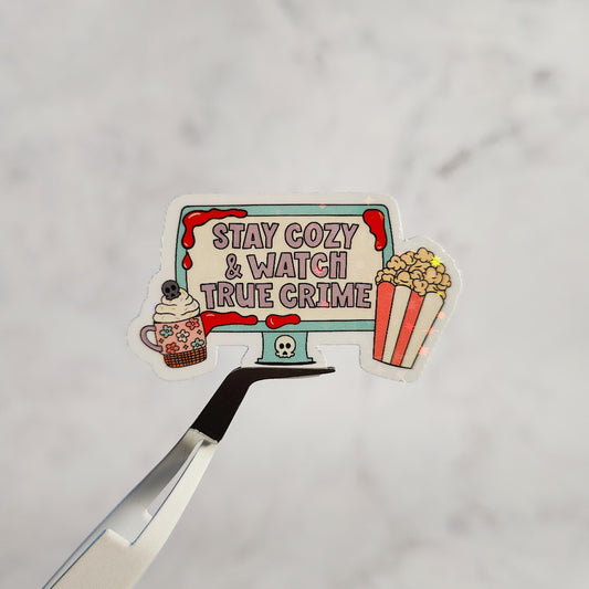 Stay Cozy And Watch True Crime Holographic Sticker