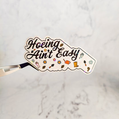 Hoeing Ain't Easy Holographic Sticker