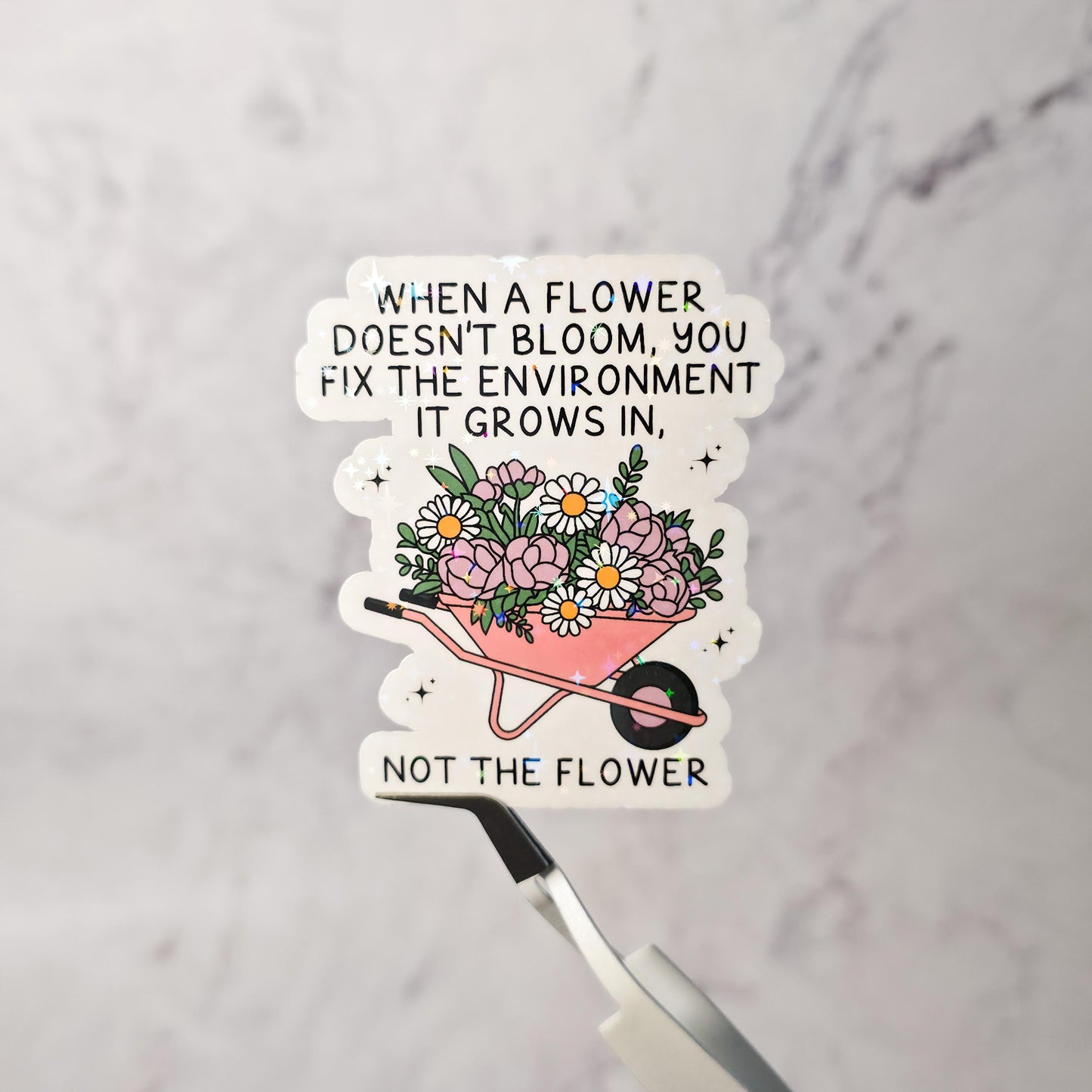 When a Flower Doesn’t Bloom Holographic Sticker – Motivational Quote – Self Growth Mental Health Vinyl Decal – Floral Wheelbarrow Sticker